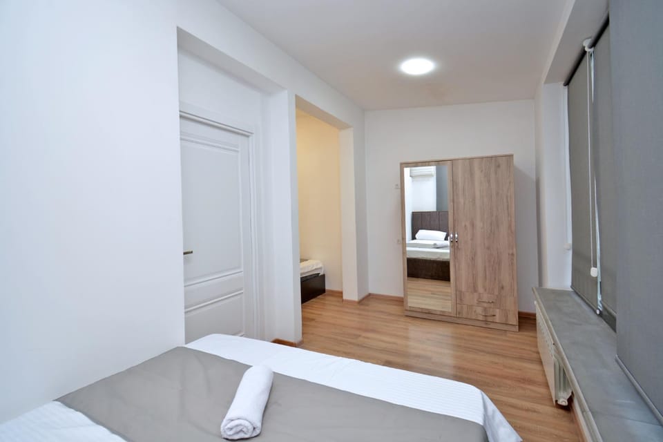 Bed, Photo of the whole room, Bedroom, towels, wardrobe