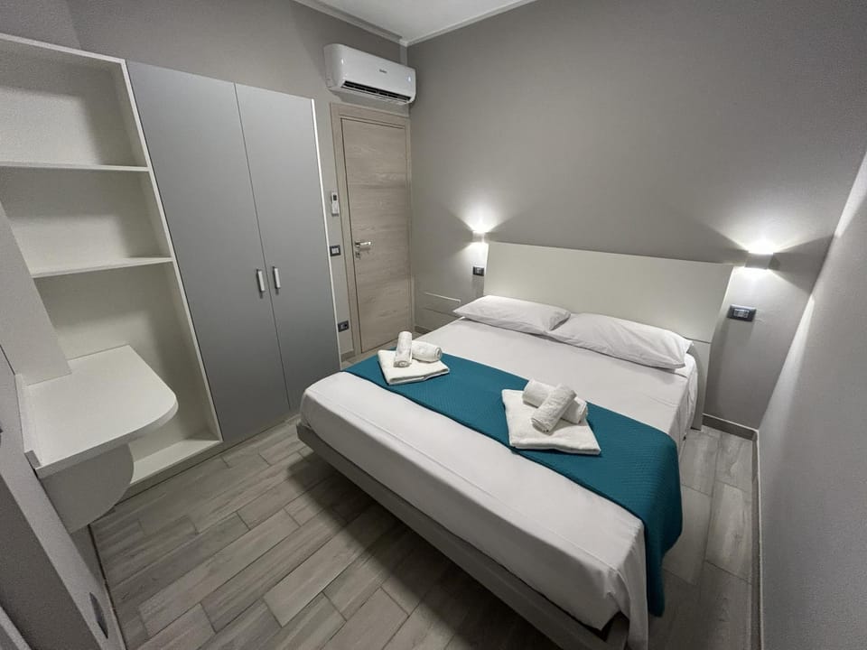 Bed, Photo of the whole room, Bedroom, towels, wardrobe, air conditioner