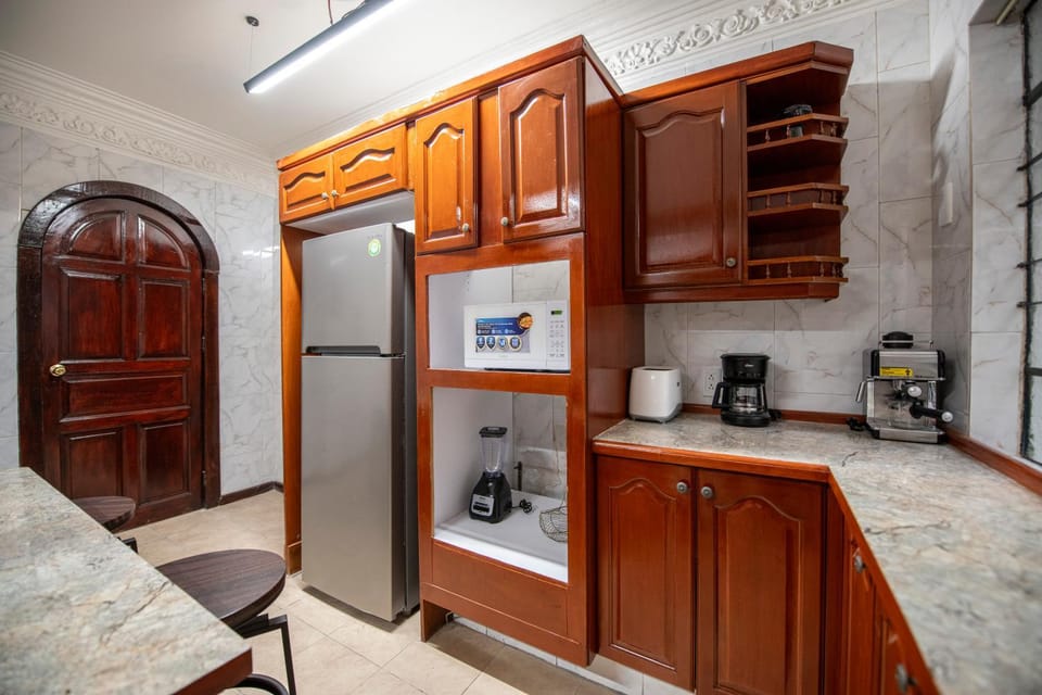 Kitchen or kitchenette, oven