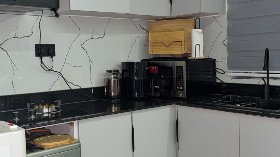 Kitchen or kitchenette, oven, stove