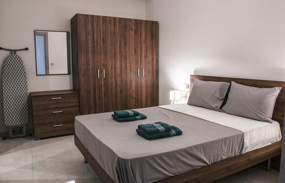 Bedroom, towels, wardrobe, air conditioner