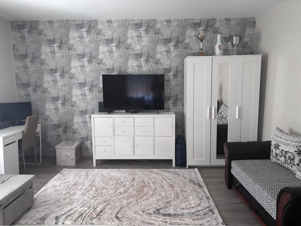 Bed, Living room, Seating area, wardrobe