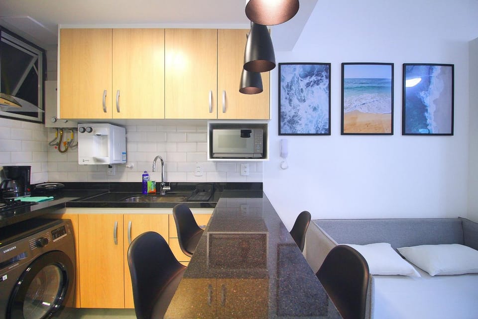 Kitchen or kitchenette, Living room, Dining area, stove, toaster, washing machine, dryer