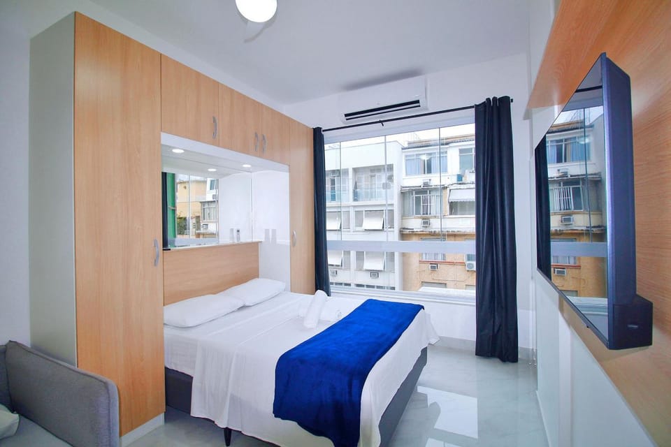 Bed, TV and multimedia, Photo of the whole room, Bedroom, Sea view, towels, wardrobe, air conditioner