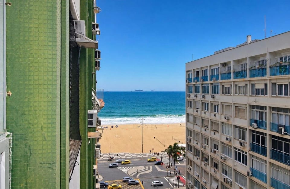Property building, Nearby landmark, Day, Neighbourhood, Natural landscape, Beach, Sea view, Location