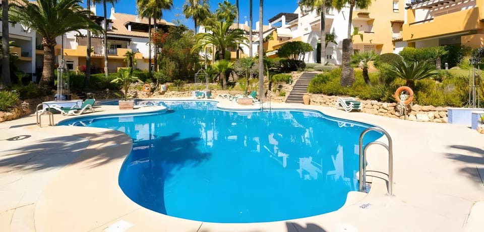 Property building, Living room, Swimming pool