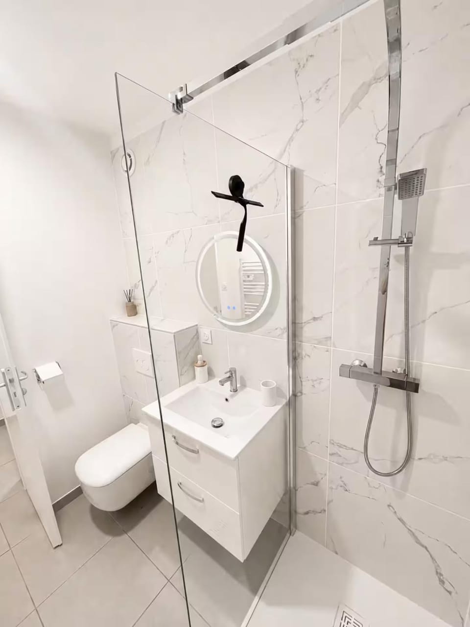 Shower, Toilet, Bathroom, hair dryier, towels