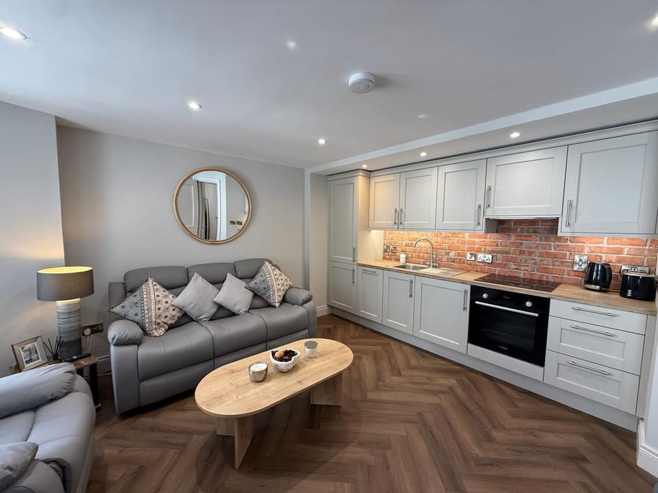 Kitchen or kitchenette, Living room, Seating area, dishwasher, stove