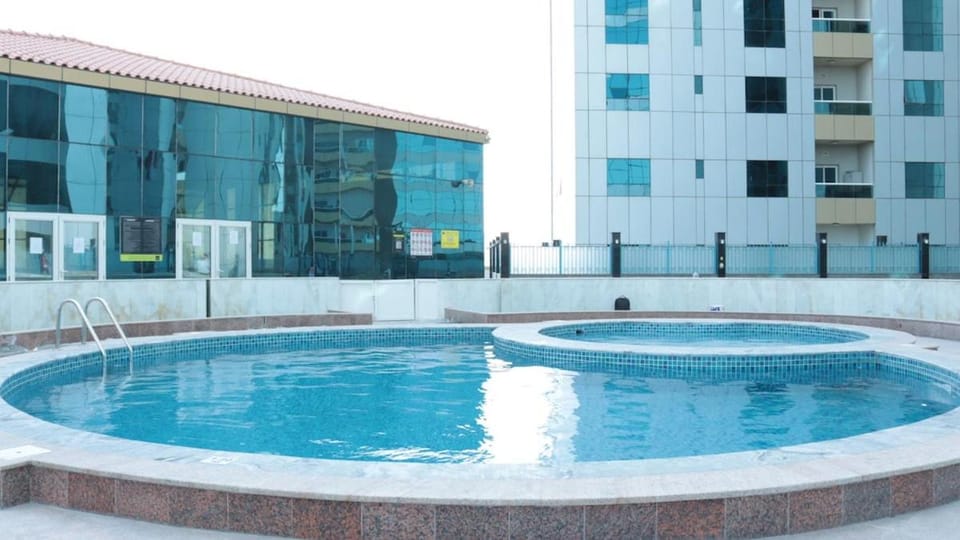 Exquisite Studio With Creek Front View Included Pool & Gym Apartment in Ajman