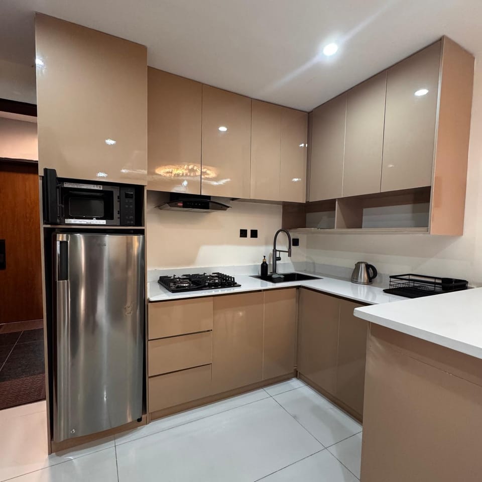 Kitchen or kitchenette, stove, toaster