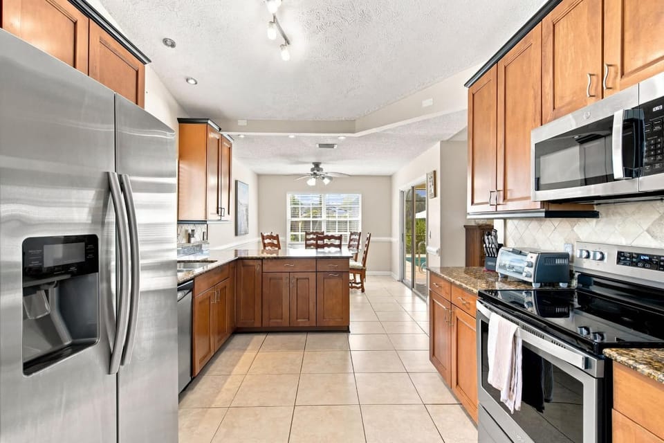 Waterfront Pool Home with Private Dock House in Port Saint Lucie