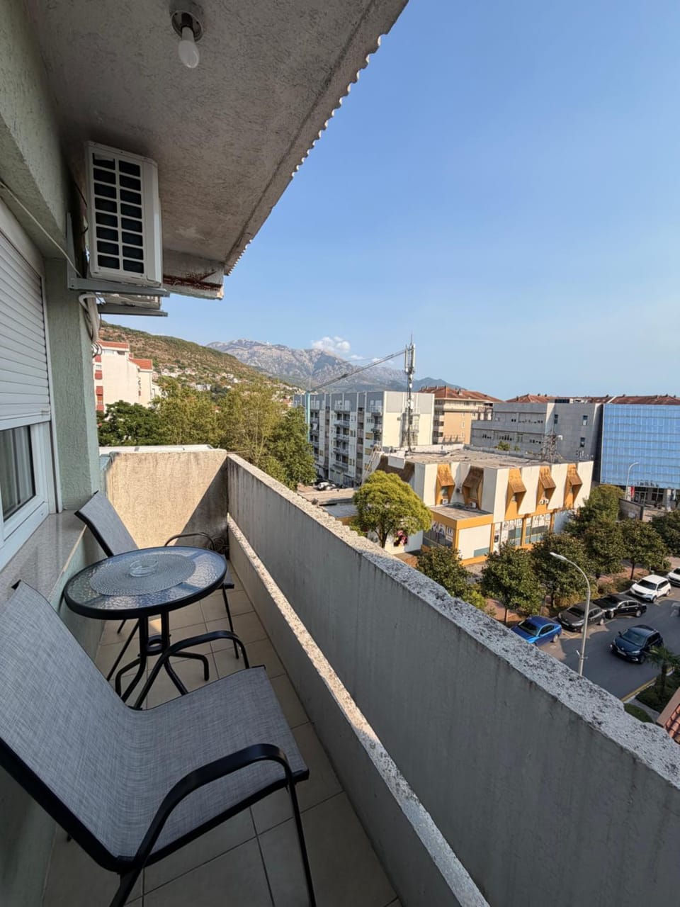 Property building, Patio, Day, Natural landscape, View (from property/room), Balcony/Terrace, Living room, Seating area, Mountain view, Sea view, Parking