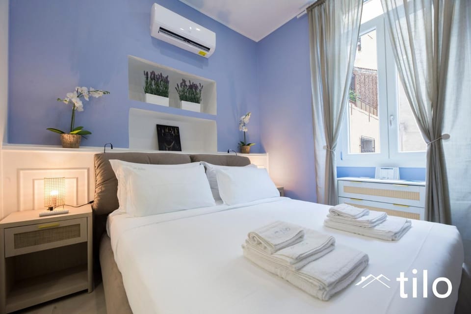 Photo of the whole room, Bedroom, Text overlay, towels, air conditioner