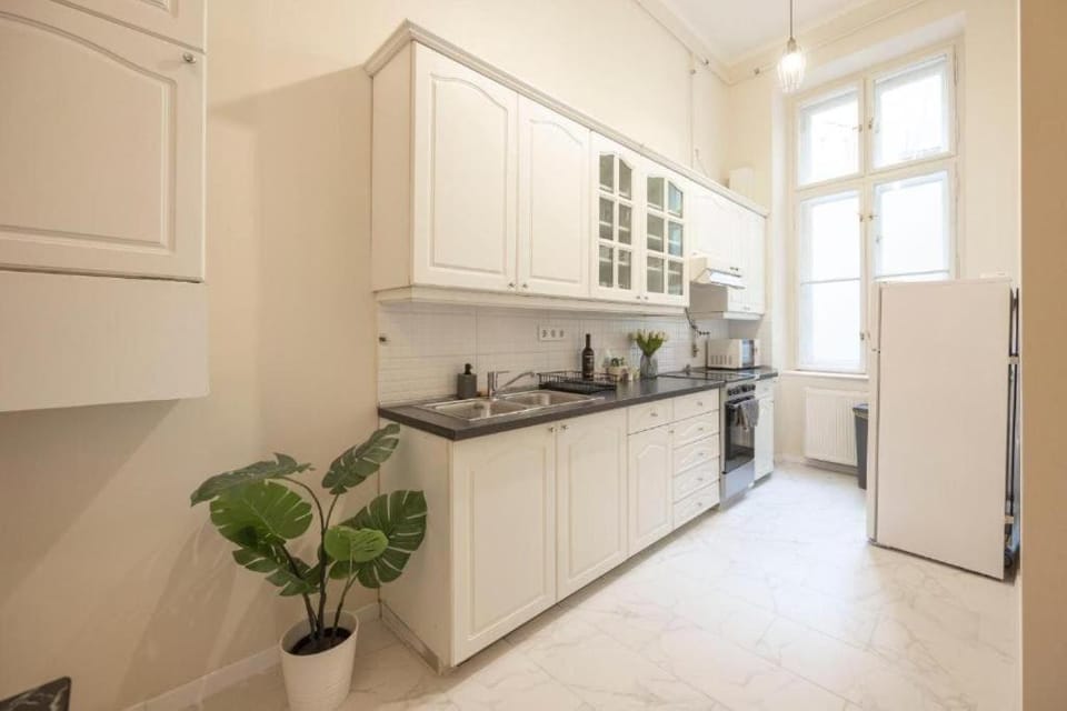 Elegant Marble 3BR Near Opera House Grand Windows Apartment in Budapest