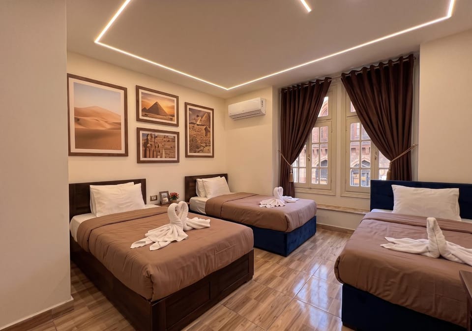Bed, Photo of the whole room, Bedroom, towels, air conditioner