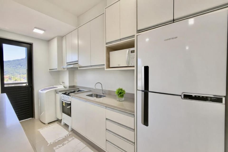 Apto a 650 m do mar com churrasqueira e garagem Apartment in State of Paraná