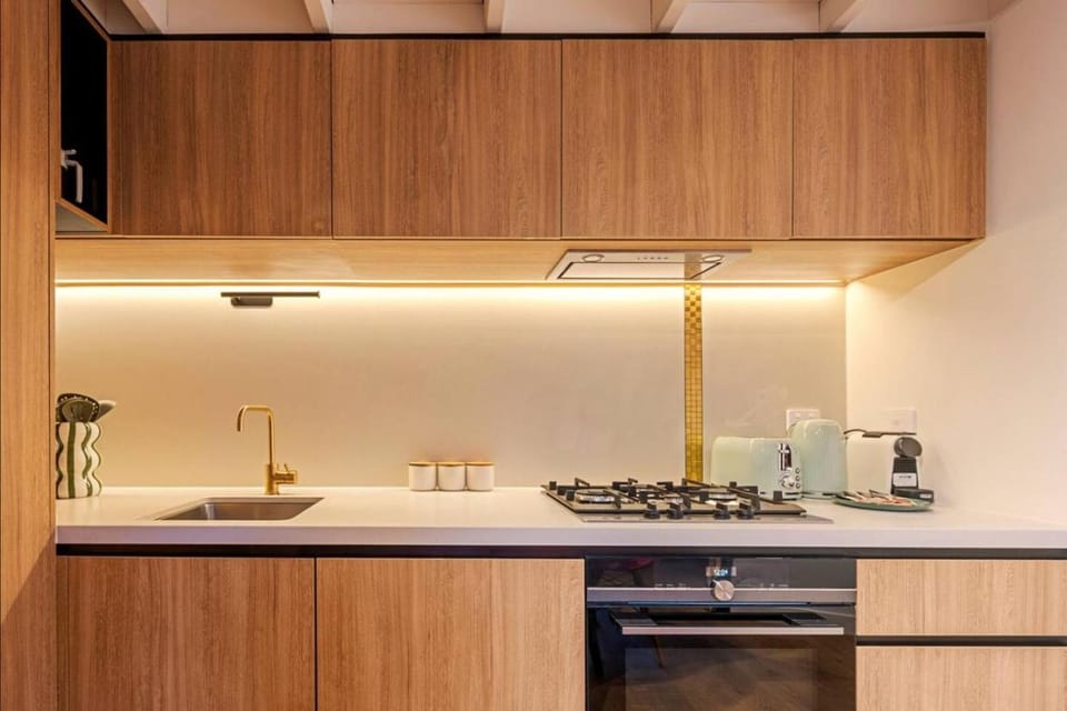 NYC-Style Loft 2BR Docklands Pool Arcade Apartment in Melbourne
