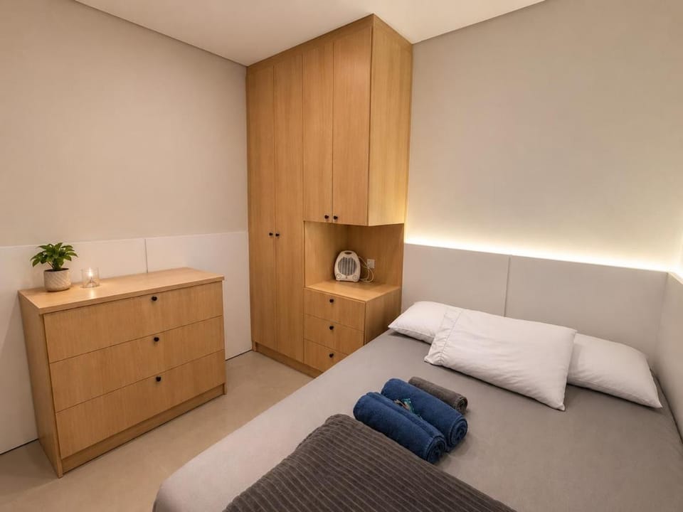 Bed, wardrobe