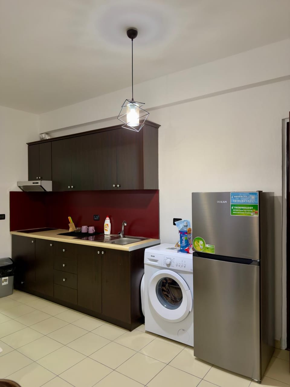 Kitchen or kitchenette, washing machine