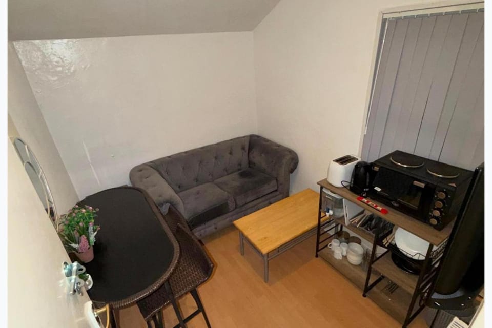 Living room, Seating area, microwave, toaster