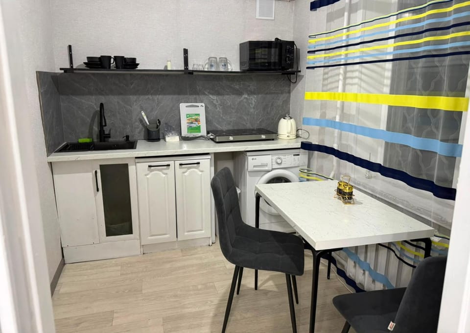 Чистая, уютная 1-комнатная квартира в районе вокзала Apartment in Kazakhstan
