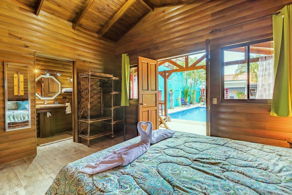 Bed, Photo of the whole room, Bedroom, Pool view, Swimming pool