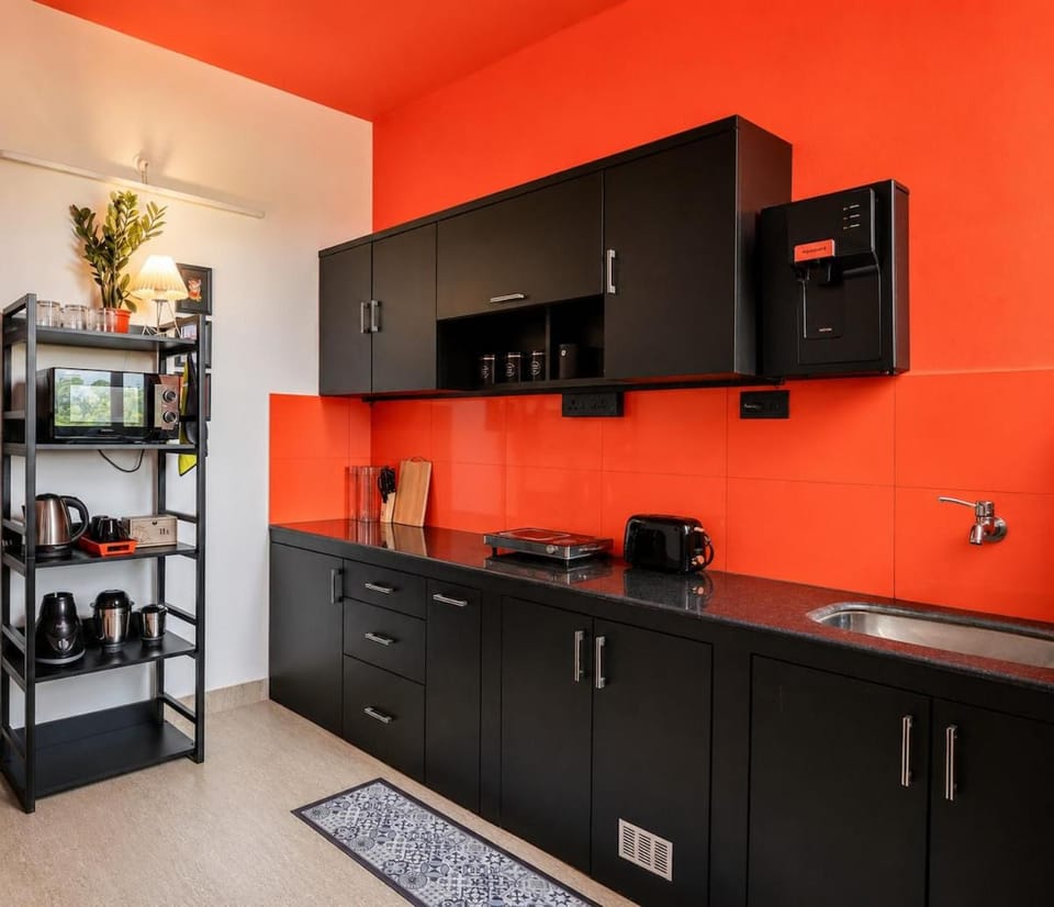 The Orange Lair Serene 1bhk Peaceful farm view flat on 1st floor in Varca Apartment in Benaulim