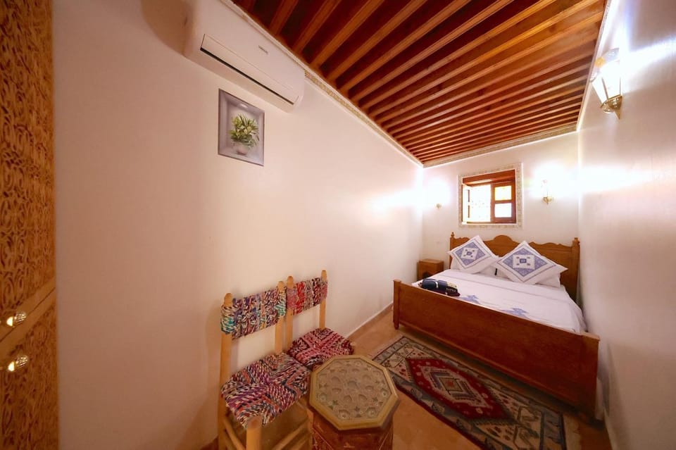 Bed, Bedroom, towels, wardrobe, air conditioner
