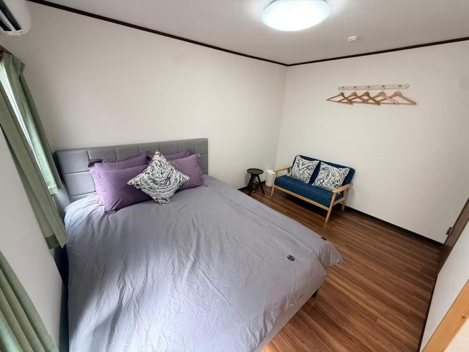 TSUKIMI Japanese-style residence with a warm wooden feel Sleeps 14 comfortably Great access to Namba and Shinsekai Villa in Osaka