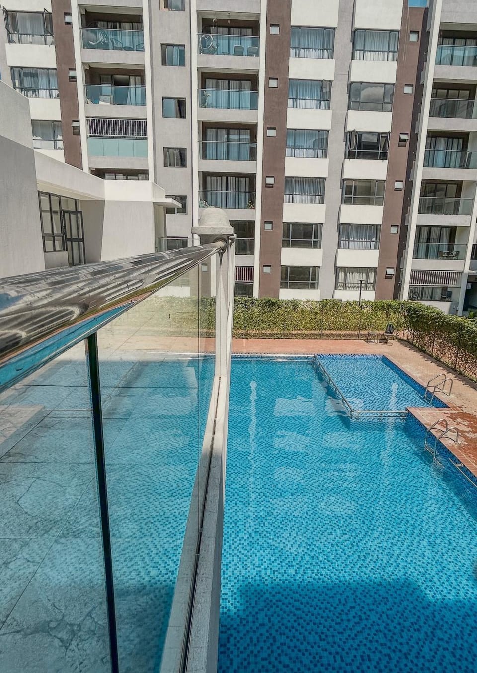 Property building, Day, Pool view, Swimming pool