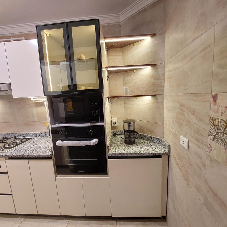 Kitchen or kitchenette, stove