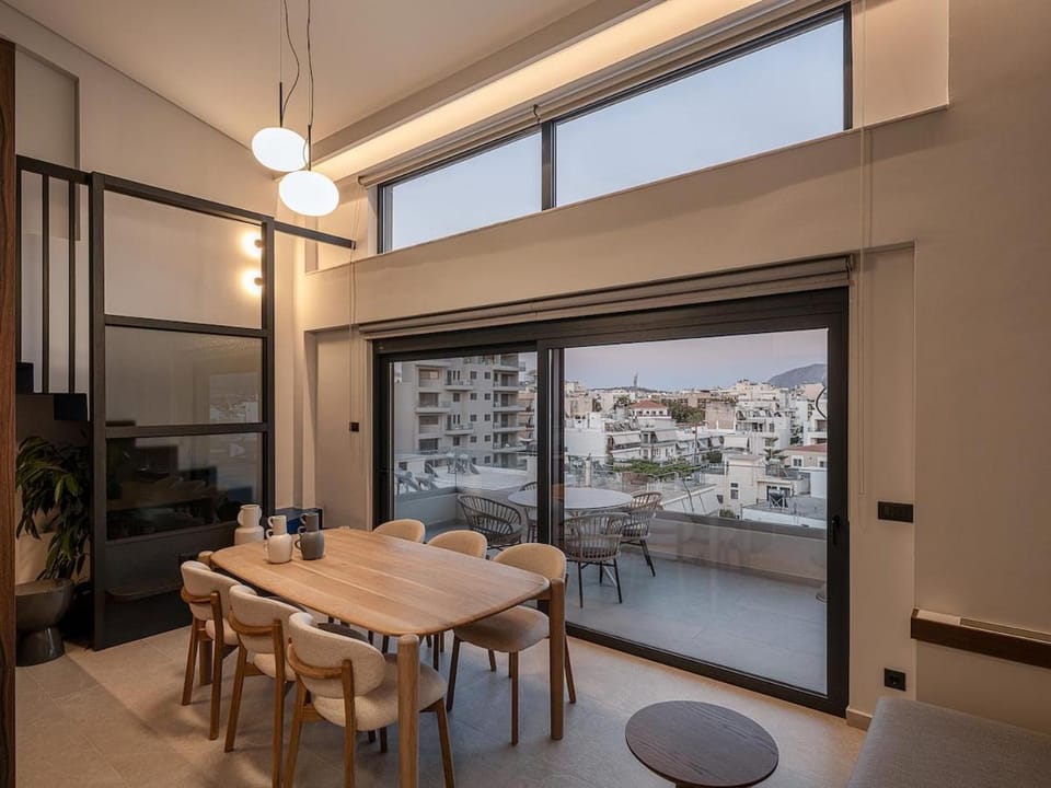 View (from property/room), Living room, Seating area, Dining area, City view