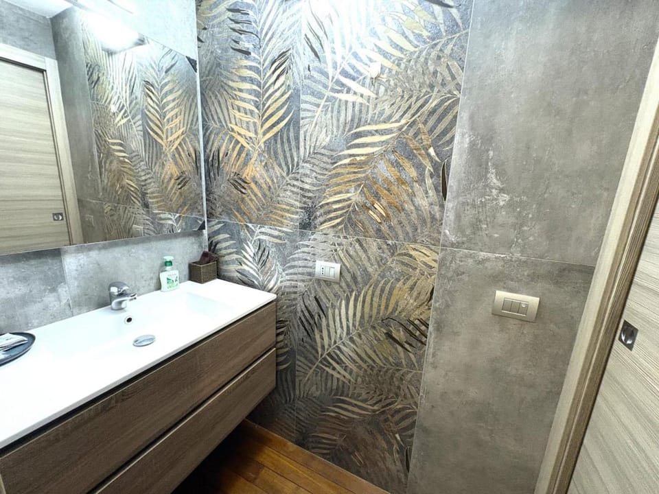Design apartment 50 meters from Metro 1 Apartment in Milan