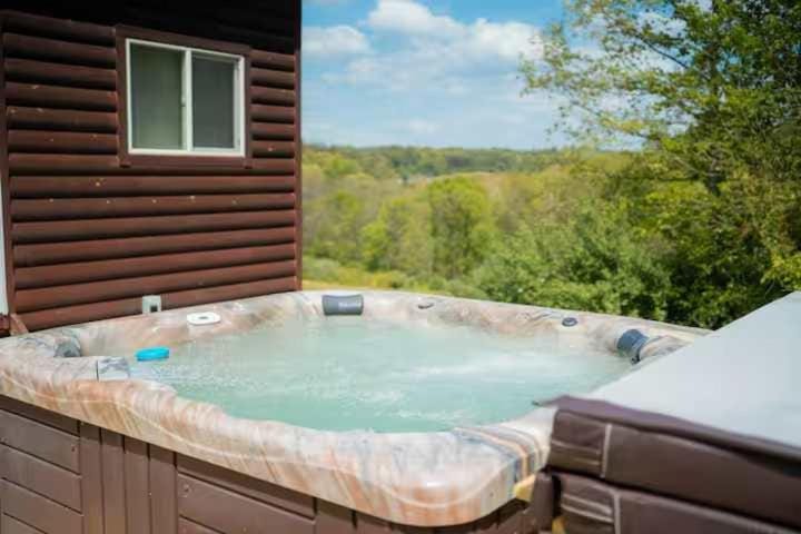 Secluded Cabin Villa with Hot Tub Pond & Hiking Cabin in Falls Township