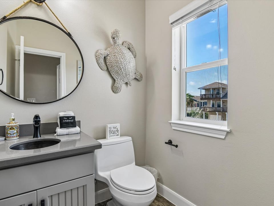 Toilet, Bathroom, hair dryier, towels