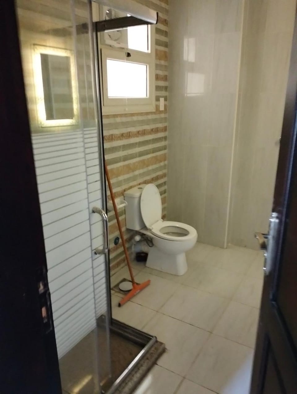 Room 2 in a three-room apartment in the Fifth Settlement compound, with air conditioning Hostel in New Cairo City