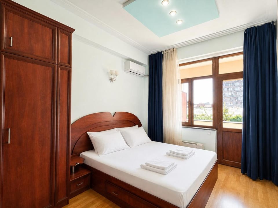 Bed, Bedroom, towels, wardrobe, air conditioner