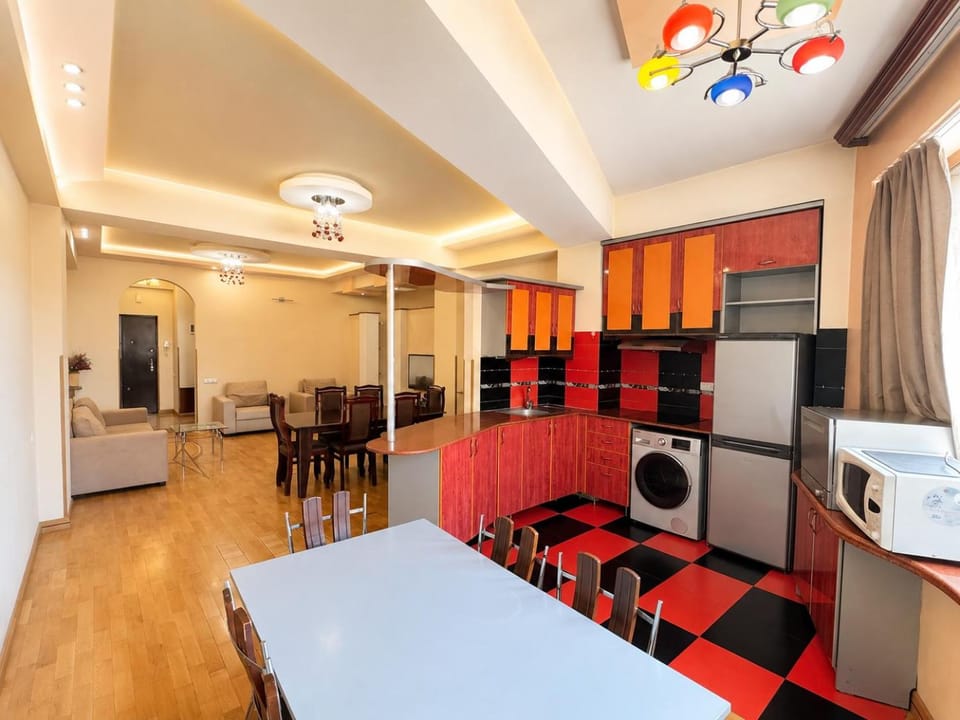 Kitchen or kitchenette, Dining area, dishwasher, oven, stove, washing machine, air conditioner