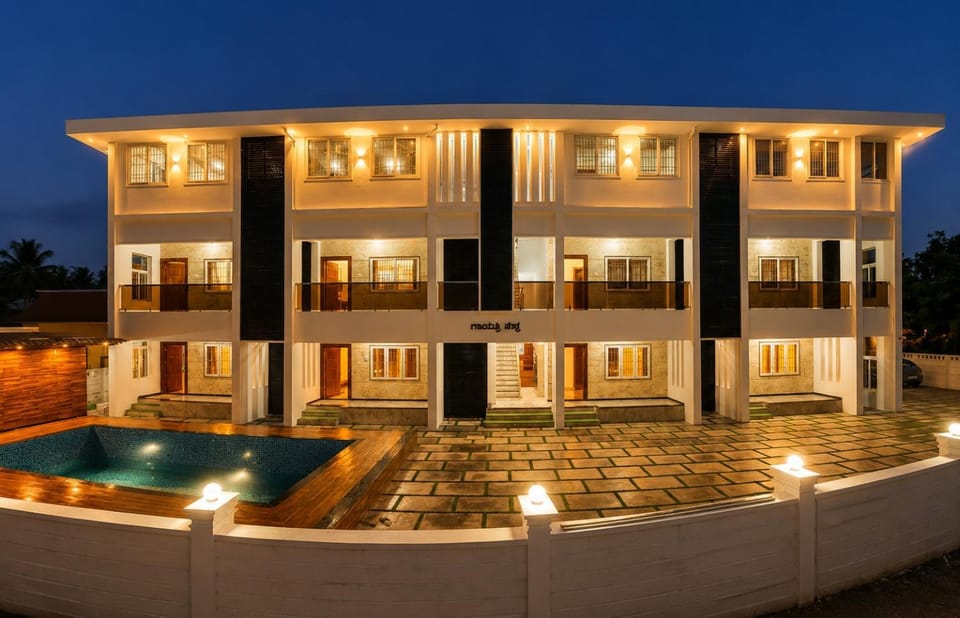 Property building, Night, View (from property/room), Pool view, Swimming pool