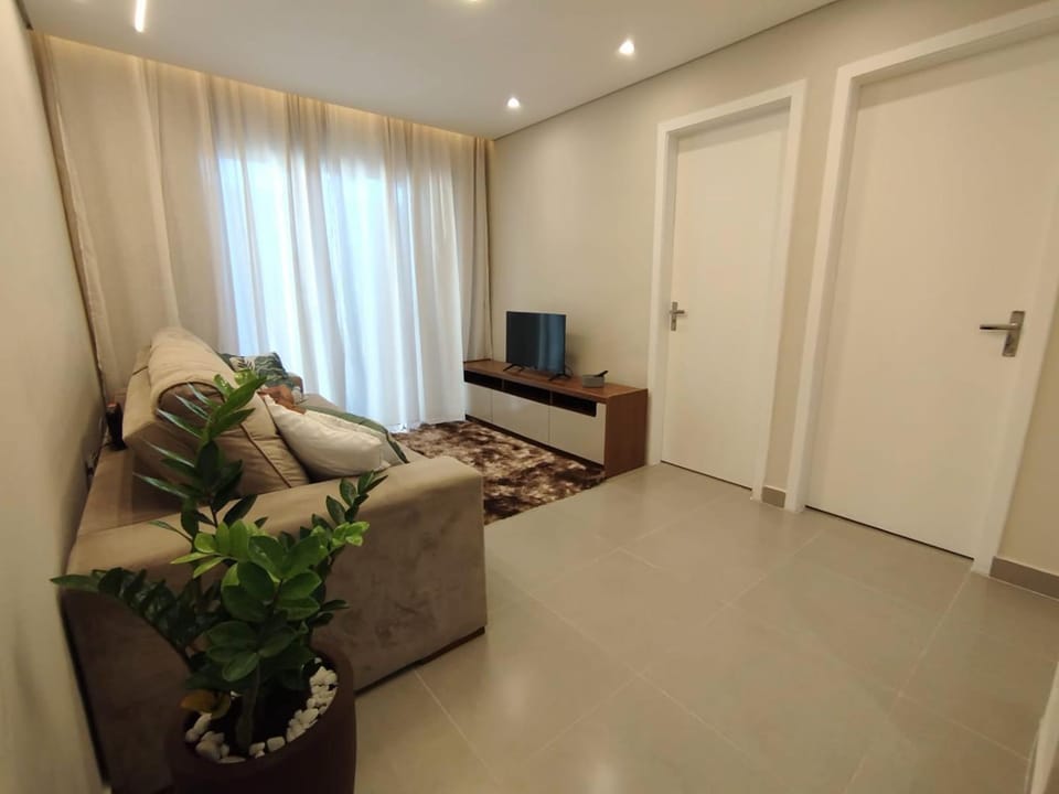 Aconchego Familiar a 200 metros da praia do centro Apartment in Bertioga