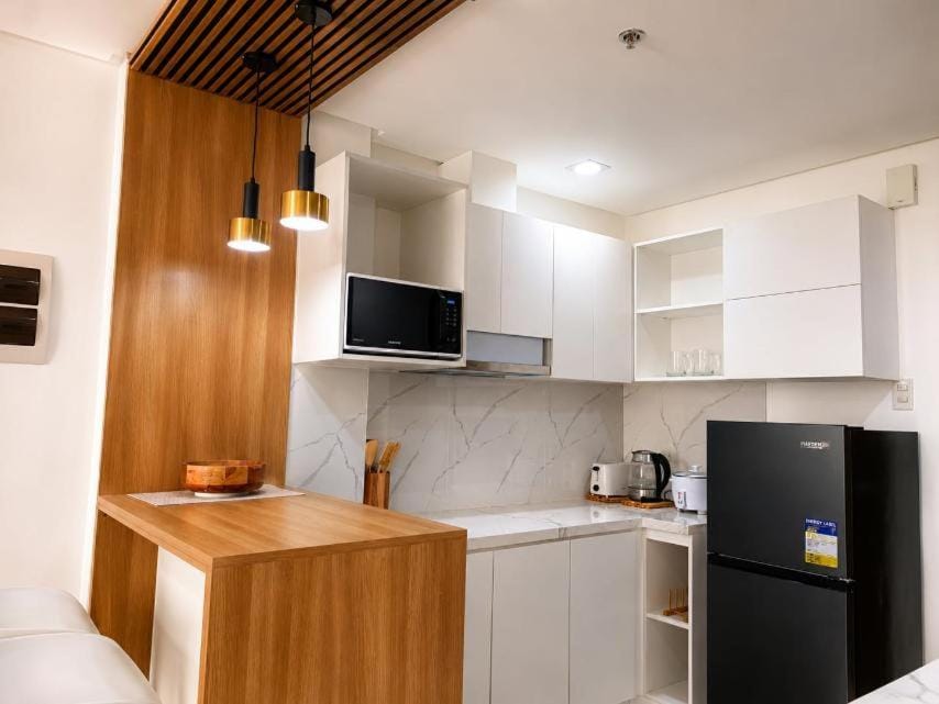 Warm & Stylish 1BR Condo One PonteFino Batangas Apartment in Batangas