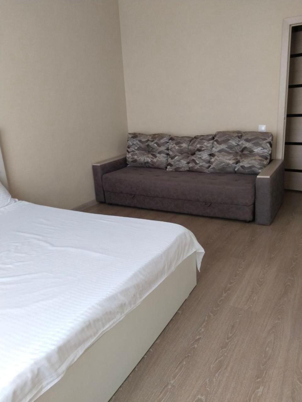 Bed, Living room, Seating area, Bedroom