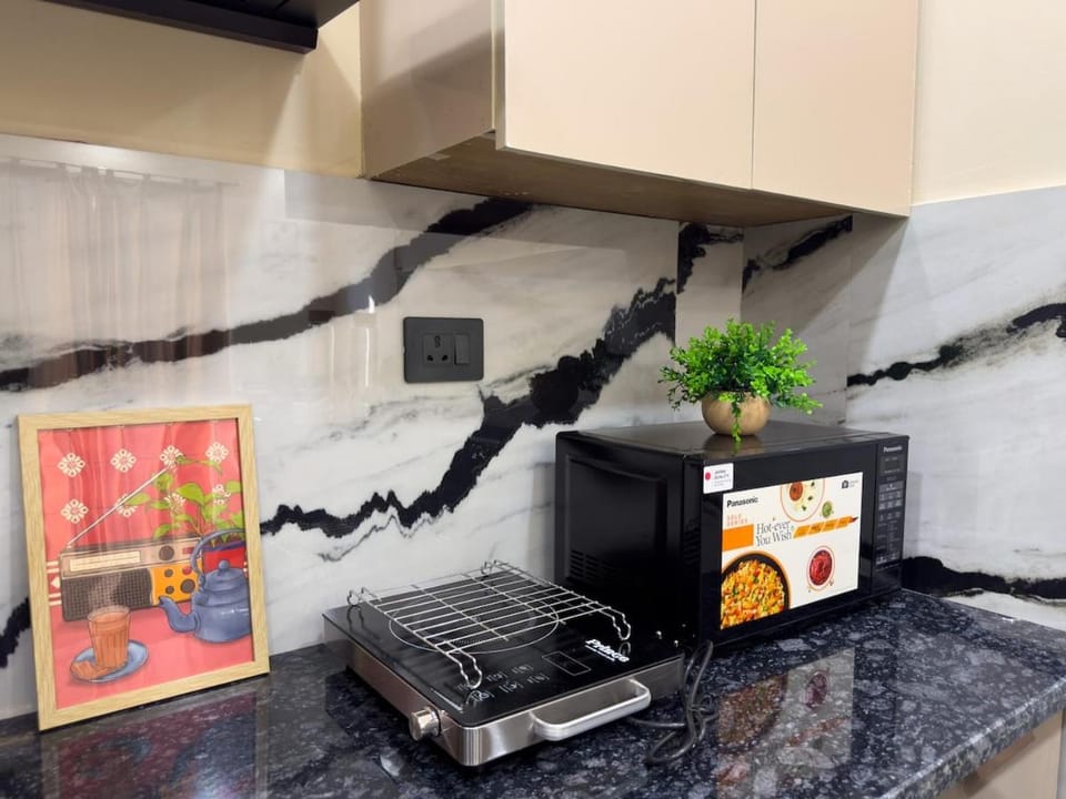 Kitchen or kitchenette, stove