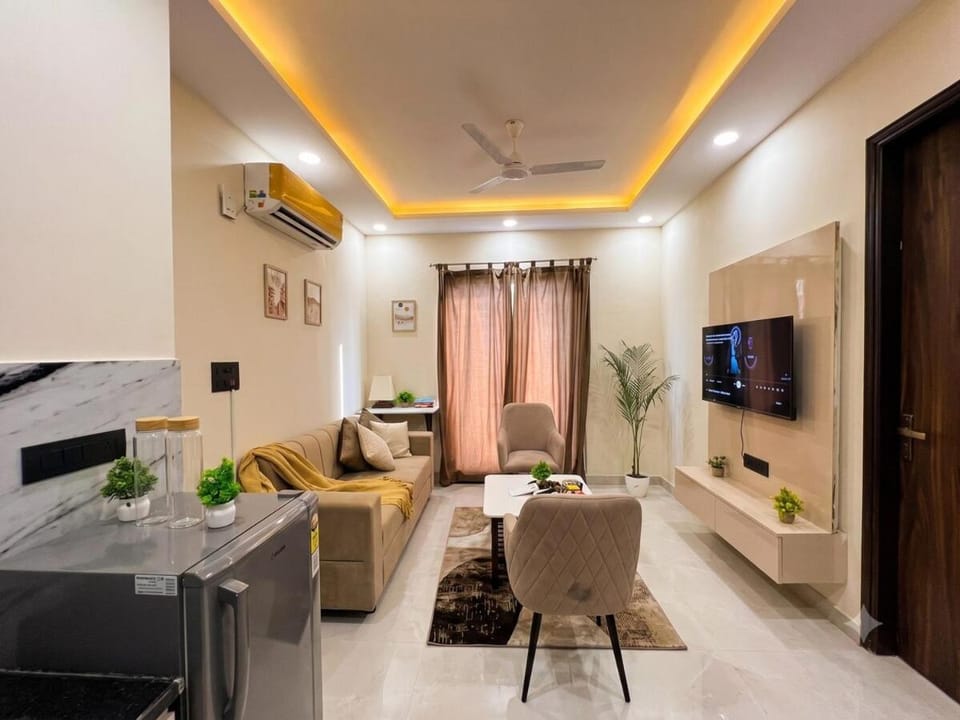 Communal lounge/ TV room, TV and multimedia, Kitchen or kitchenette, Living room, Seating area, Evening entertainment, air conditioner