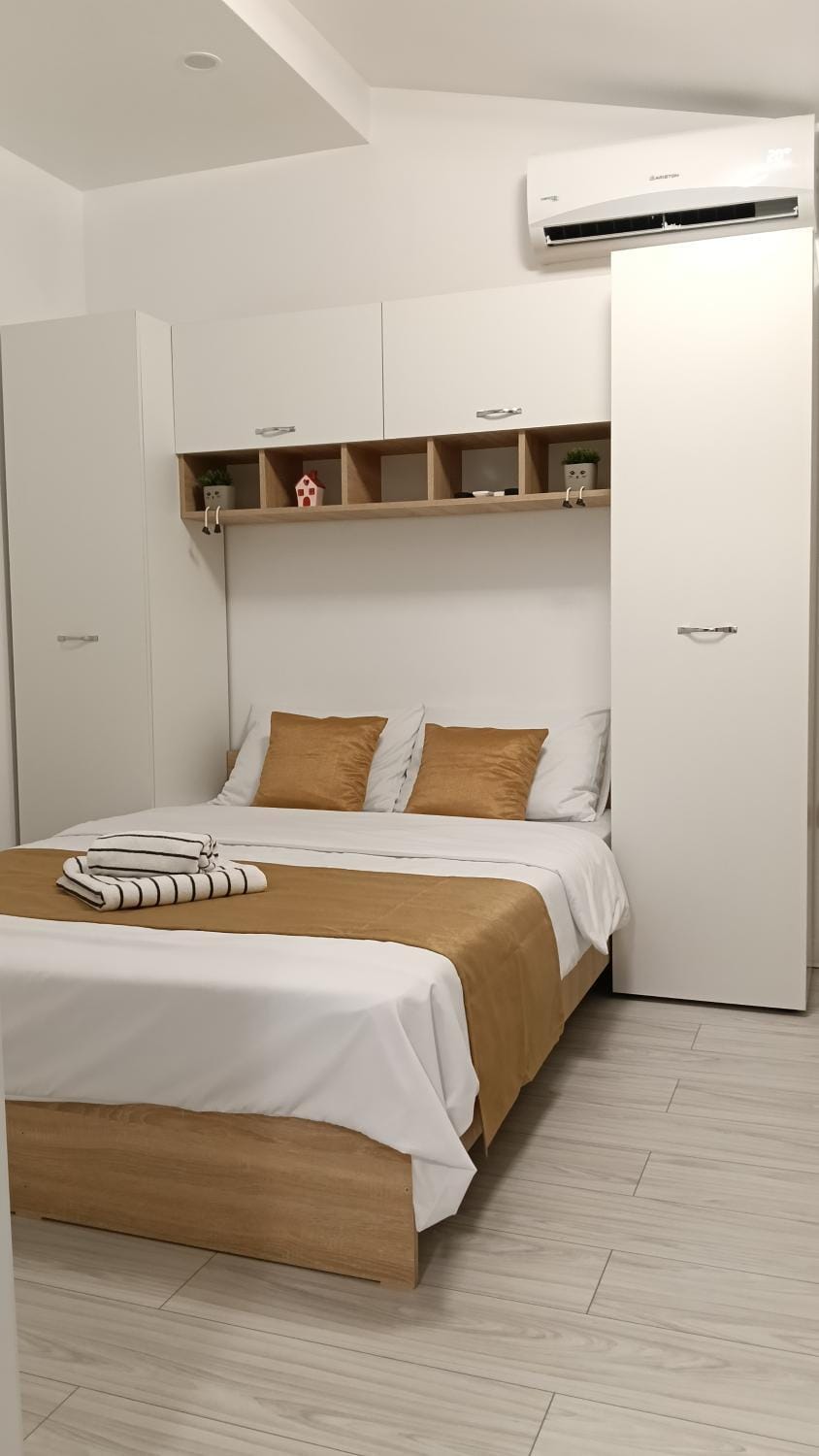 Bed, Photo of the whole room, Bedroom, towels, wardrobe, air conditioner
