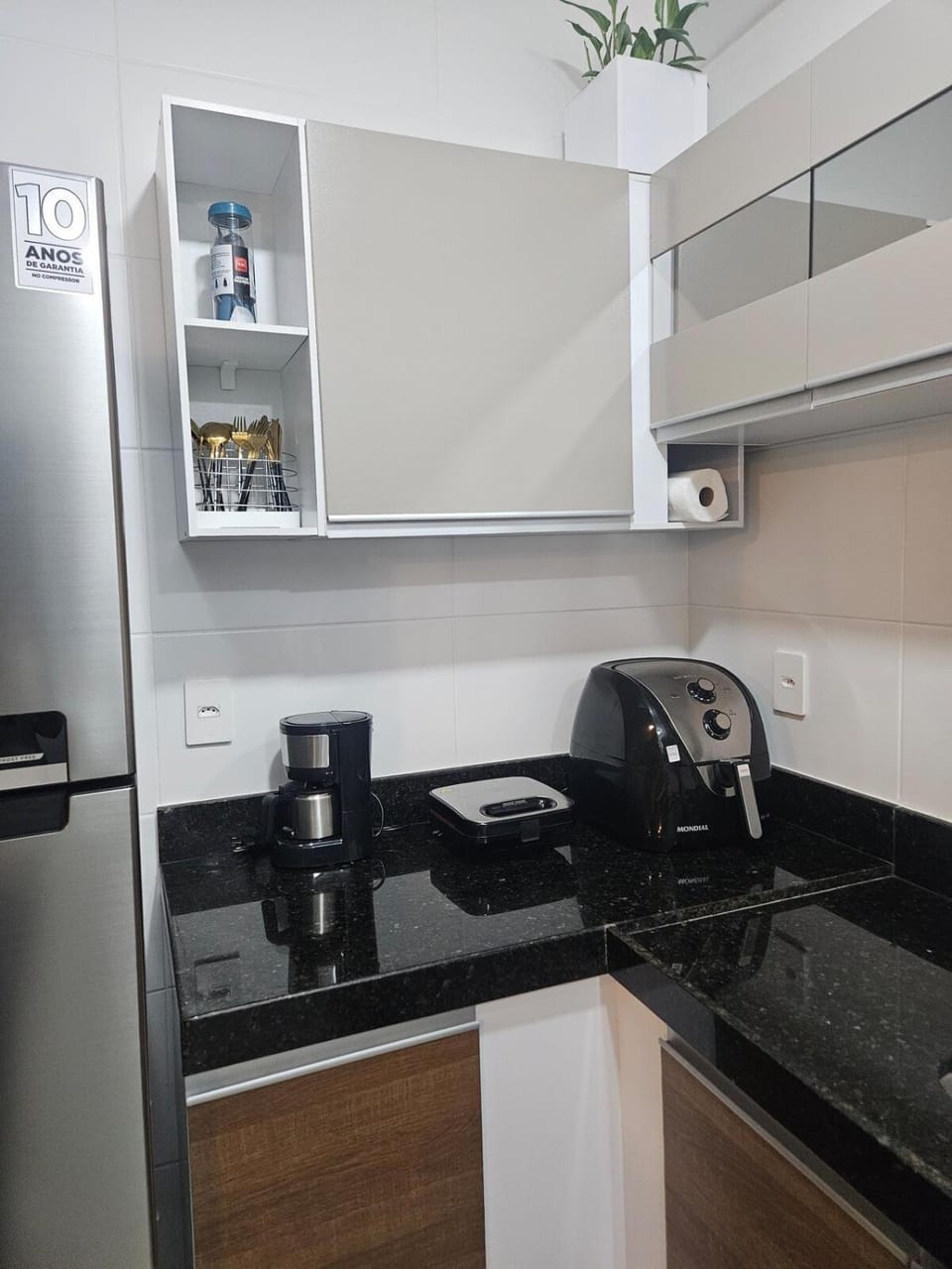 Kitchen or kitchenette, stove, toaster