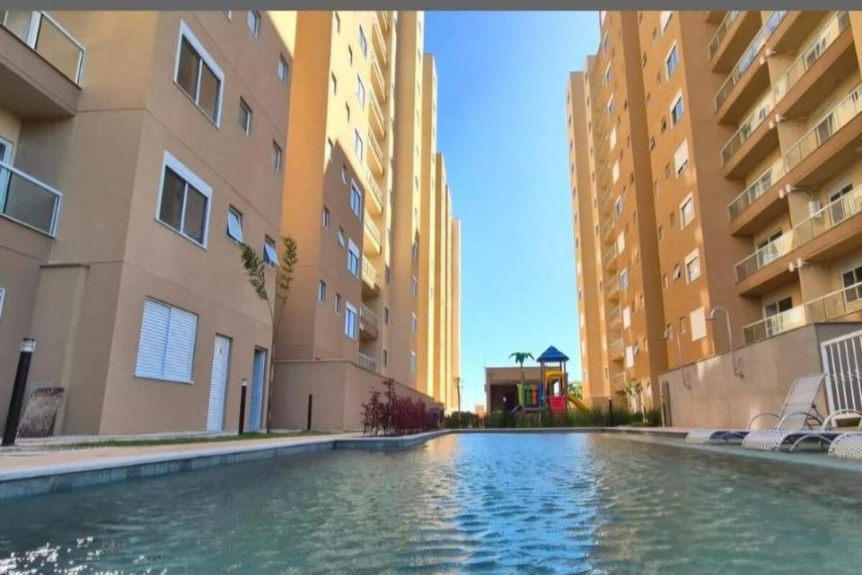 Property building, Pool view, Swimming pool, sunbed