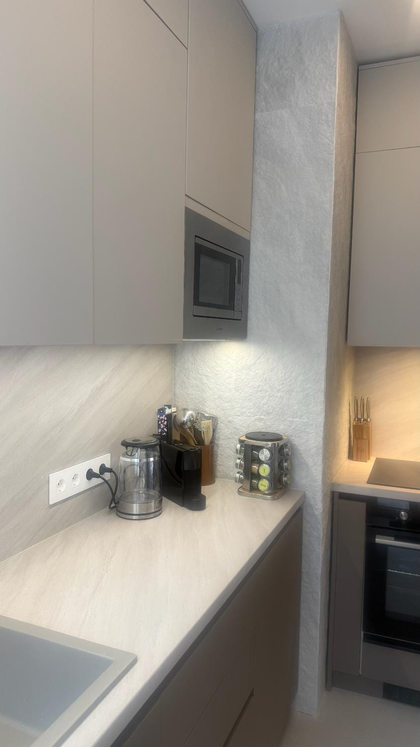 Kitchen or kitchenette, oven, toaster