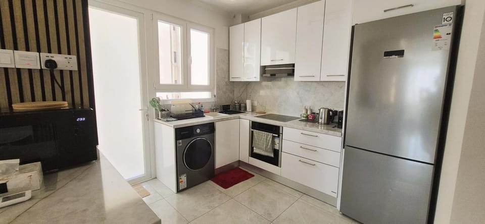 Kitchen or kitchenette, oven, stove, toaster