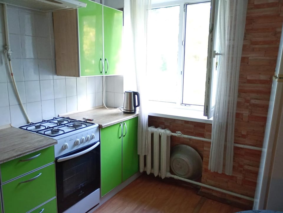 Kitchen or kitchenette, oven, stove